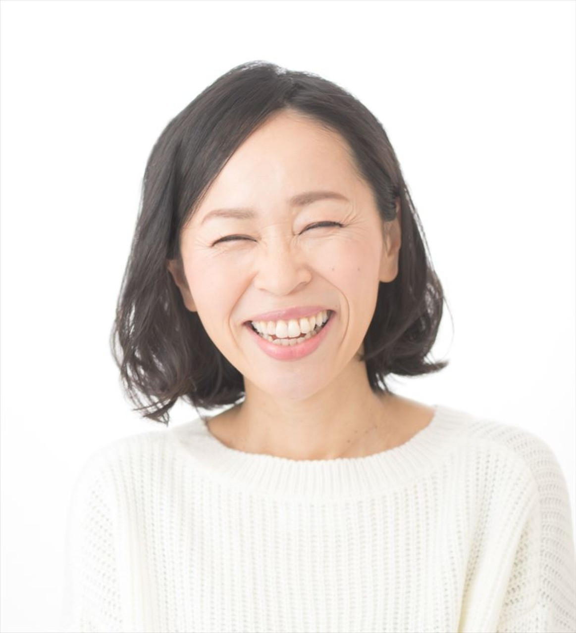 当研究所代表である松本真紀子氏の笑顔の写真